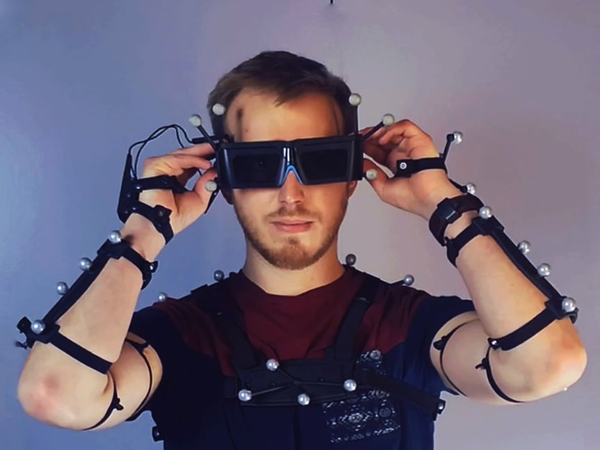 engineer-wearing-a-bodytracking-suit-and-is-training-in-VR-1200x+900